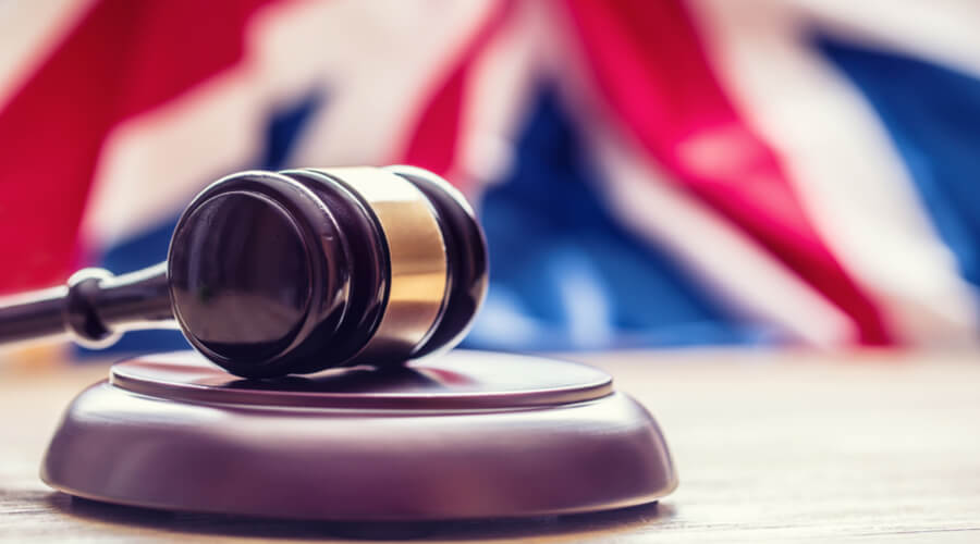Gambling laws in the UK with flag and judge gavel